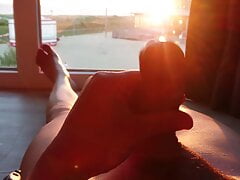 masturbation at my hotel window at sunset