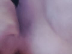 lying in bed and riding a dildo and caressing my asshole with my cock