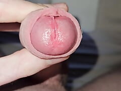 Young pale man masturbating and ejaculating in his bedroom